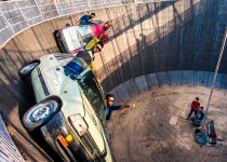 Car stunt in the wall