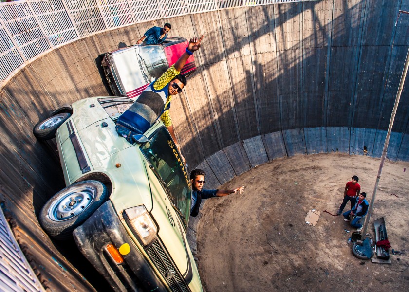 Car stunt in the wall