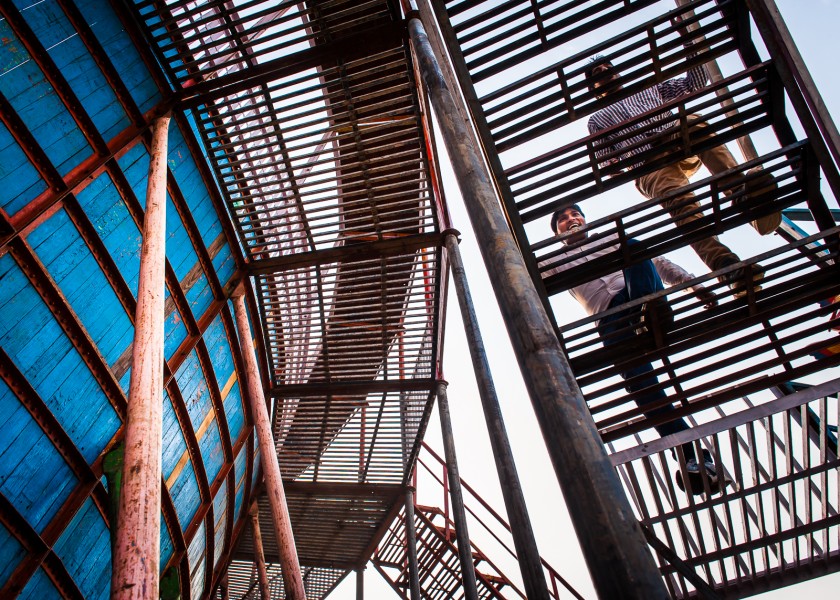 Spectators climbing the Wall for the next show